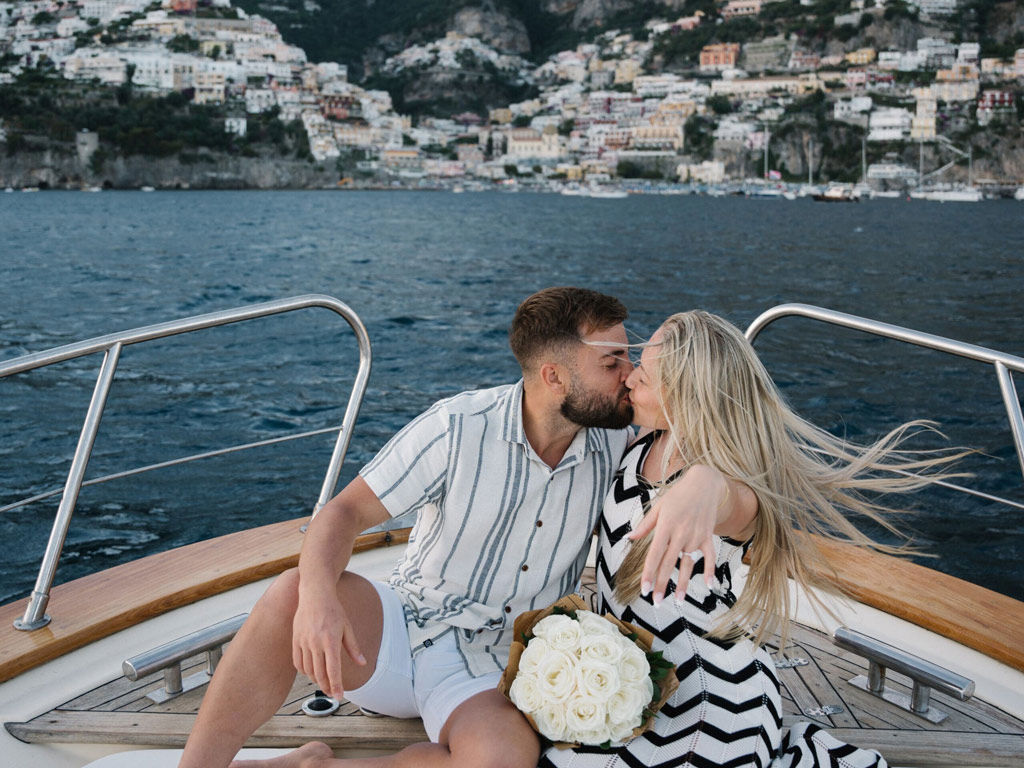 amalfi-coast-tour-wedding-proposal-kissing-flowers